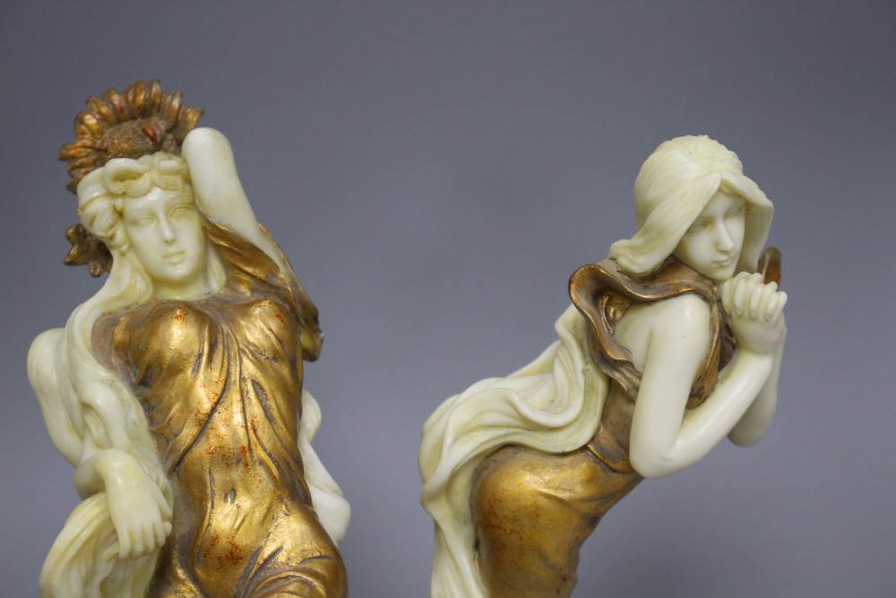 A set of four Italian gilt resin figures of maidens representing The Seasons, stamped STT, height 20cm